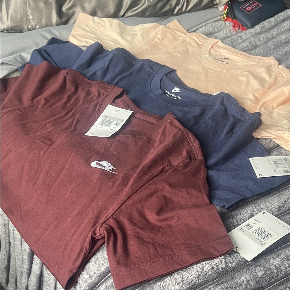 Nike T-Shirt Trio in Maroon, Navy, and Pink